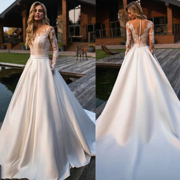 Le top 3 des robes de mariée intemporelle ! image 1 | Soirée Blanche Le top 3 des robes de mariée intemporelle : Robe De Mariée Princesse Luxe A Manches Longues