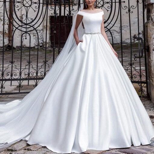 Robe De Mariée Manches Courtes Bouffantes Et Dentelle Florale image 5 | Soirée Blanche