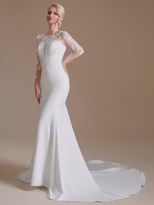 Robe de mariée à encolure bateau en dentelle image 7 | Soirée Blanche